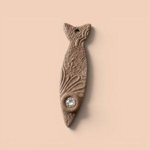 example fish made of bronze clay with clay cutter is fish shape, clay cutout form